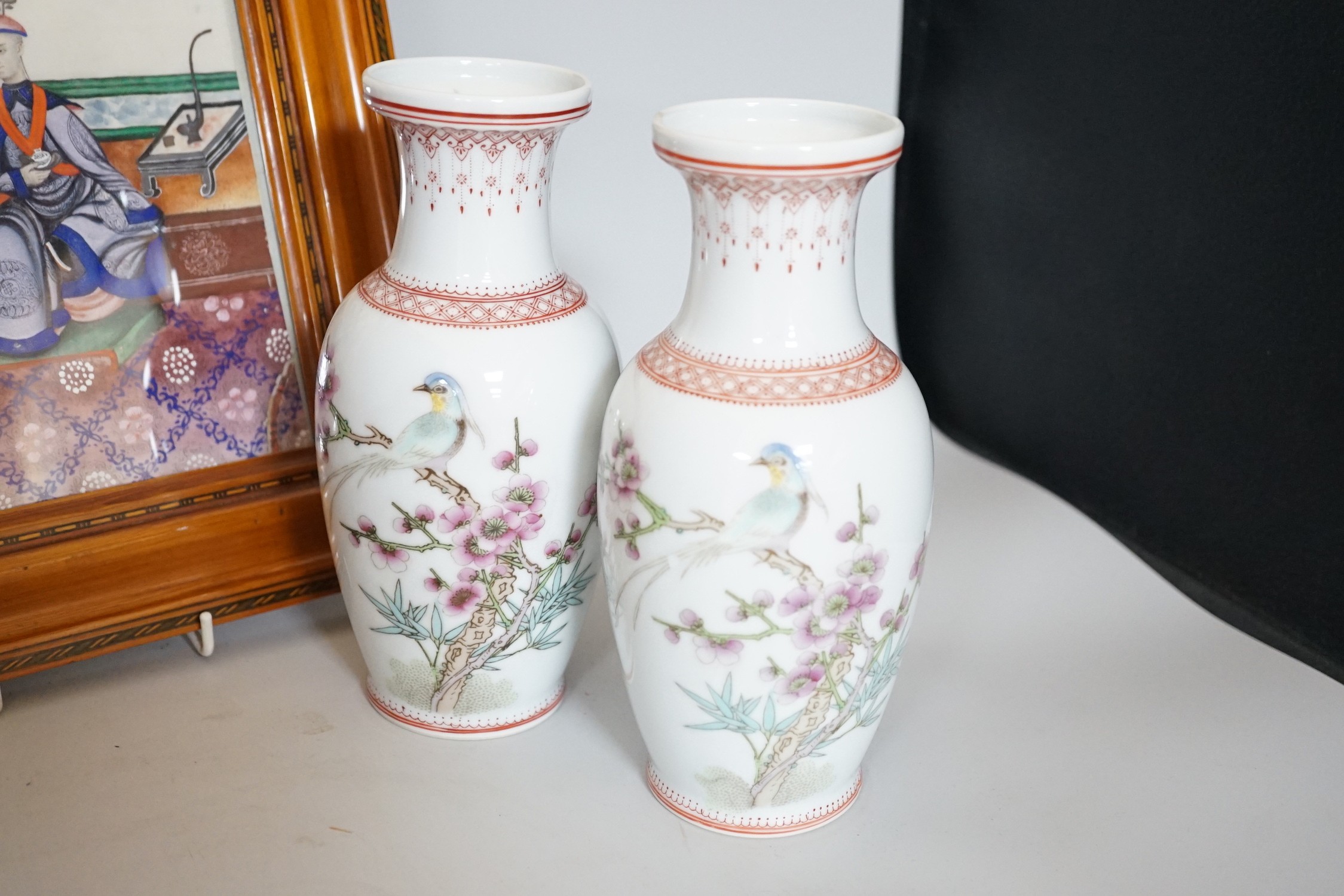 A pair of Chinese famille rose vases, possibly Republic period, and a framed figural pith painting, vases 21cms high